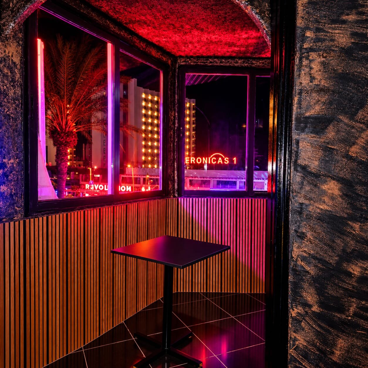 Corner with high table and window view